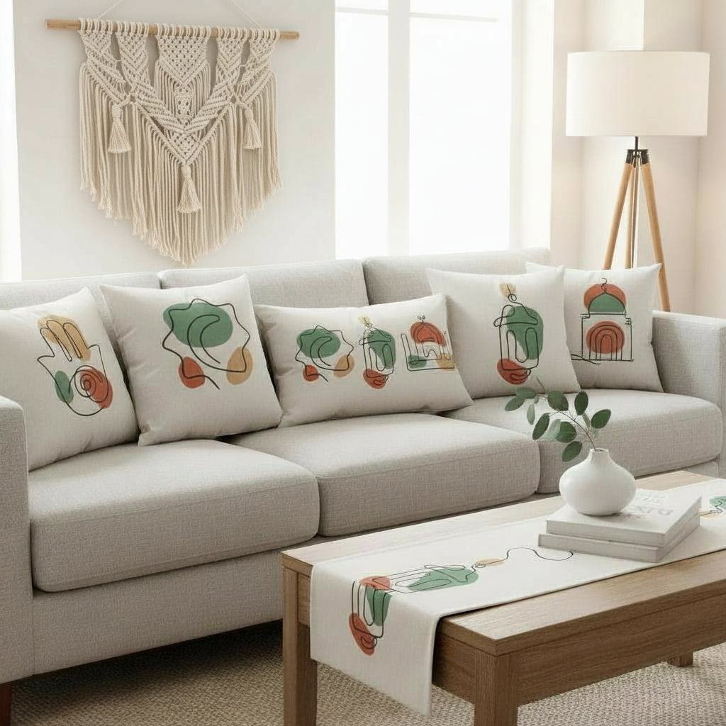 Living room with a gray sectional sofa, decorative pillows, and a coffee table.